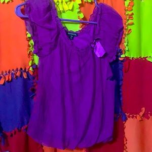 I am selling a purple fluffy shirt